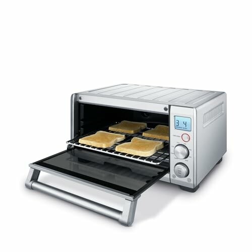 Toaster oven with toasted bread inside.